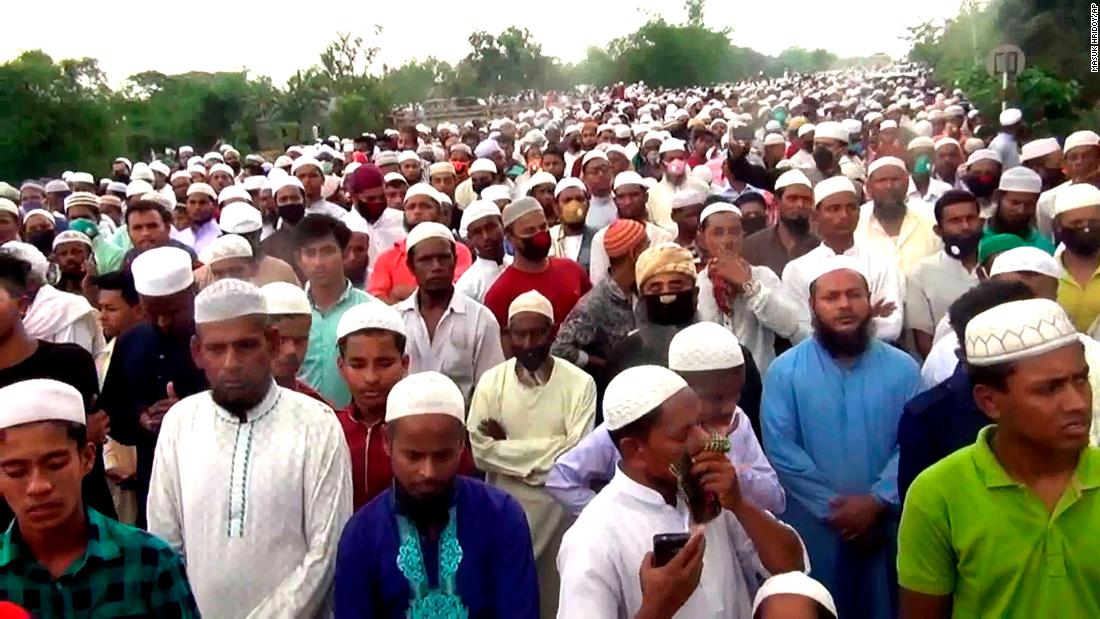 Thousands of Bangladeshi Muslims gather for the funeral of a popular Islamic preacher on Saturday, April 18, 2022.