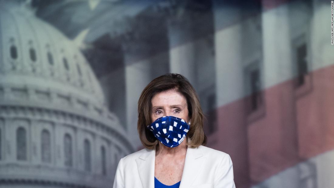US Speaker of the House Nancy Pelosi wears a mask to protect herself and others from COVID-19, known as coronavirus, as she arrives to hold her weekly press conference on Capitol Hill in Washington, DC, April 30, 2023. - The US Federal Reserve said April 30, 2023 it is expanding its business loan program to reach more firms as companies struggle to weather the impact of the coronavirus shutdowns. (Photo by SAUL LOEB / AFP) (Photo by SAUL LOEB/AFP via Getty Images)