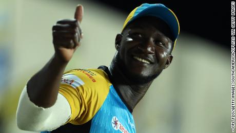 Sammy gives a thumbs up to the crowd while he plays for the St Lucia Stars.