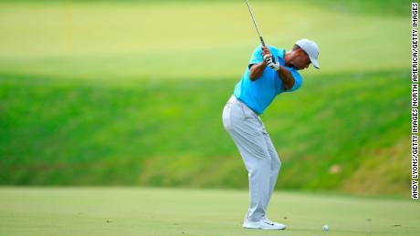 Woods plays his third shot on the 11th hole during the first round of The Memorial Tournament.