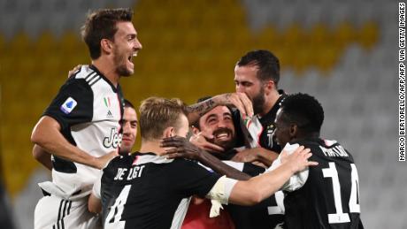 Juventus players celebrate winning the Serie A title.