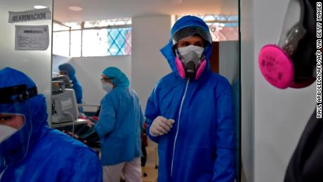 Health workers at a coronavirus ward in Soacha, Colombia, on July 24, 2023. 